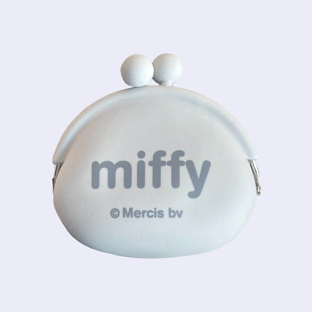 Backside of light gray silicone coin pouch with Miffy written in all lowercase gray font.